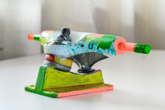 Skateboard trucks mounted on a deck, ready for action.