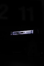 A sleek IoT device connected wirelessly in an industrial setting, showcasing edge technology.