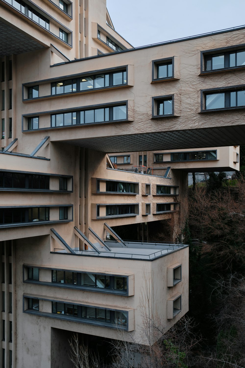 a large building with many windows on the side of it