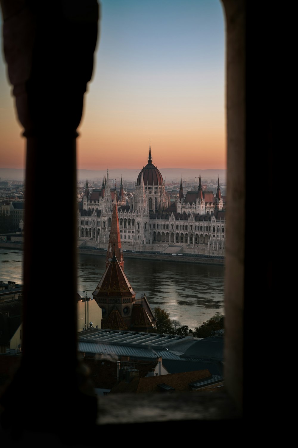 a view of a large building from a window