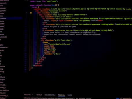 A computer screen displays software code in a text editor. The code seems to be related to a web page with HTML and CSS components. On the left side, a file tree shows various file names in a project. The code includes HTML structure and styling classes.