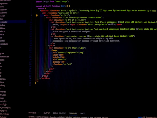 A computer screen displays software code in a text editor. The code seems to be related to a web page with HTML and CSS components. On the left side, a file tree shows various file names in a project. The code includes HTML structure and styling classes.