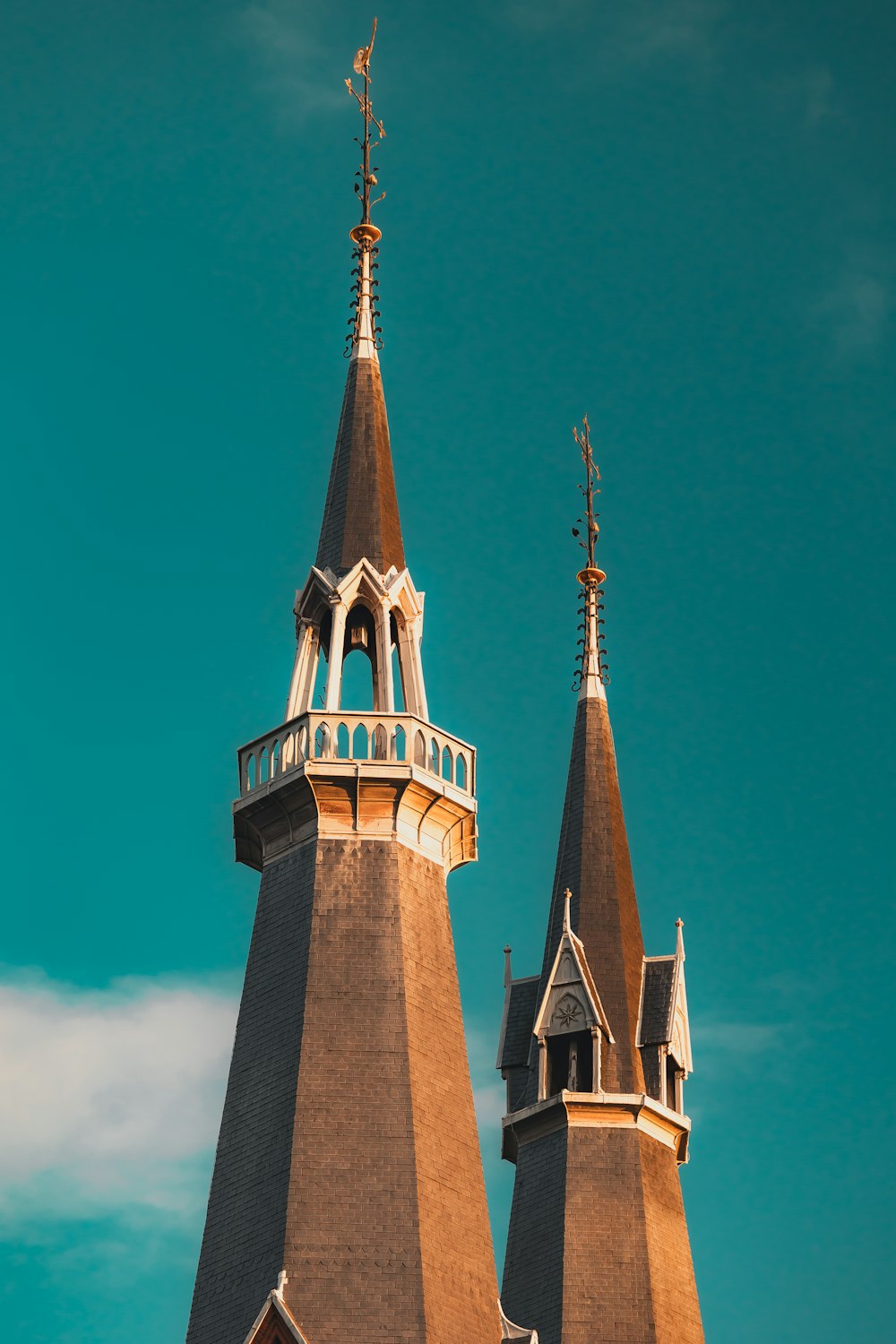 a church steeple with a clock on it