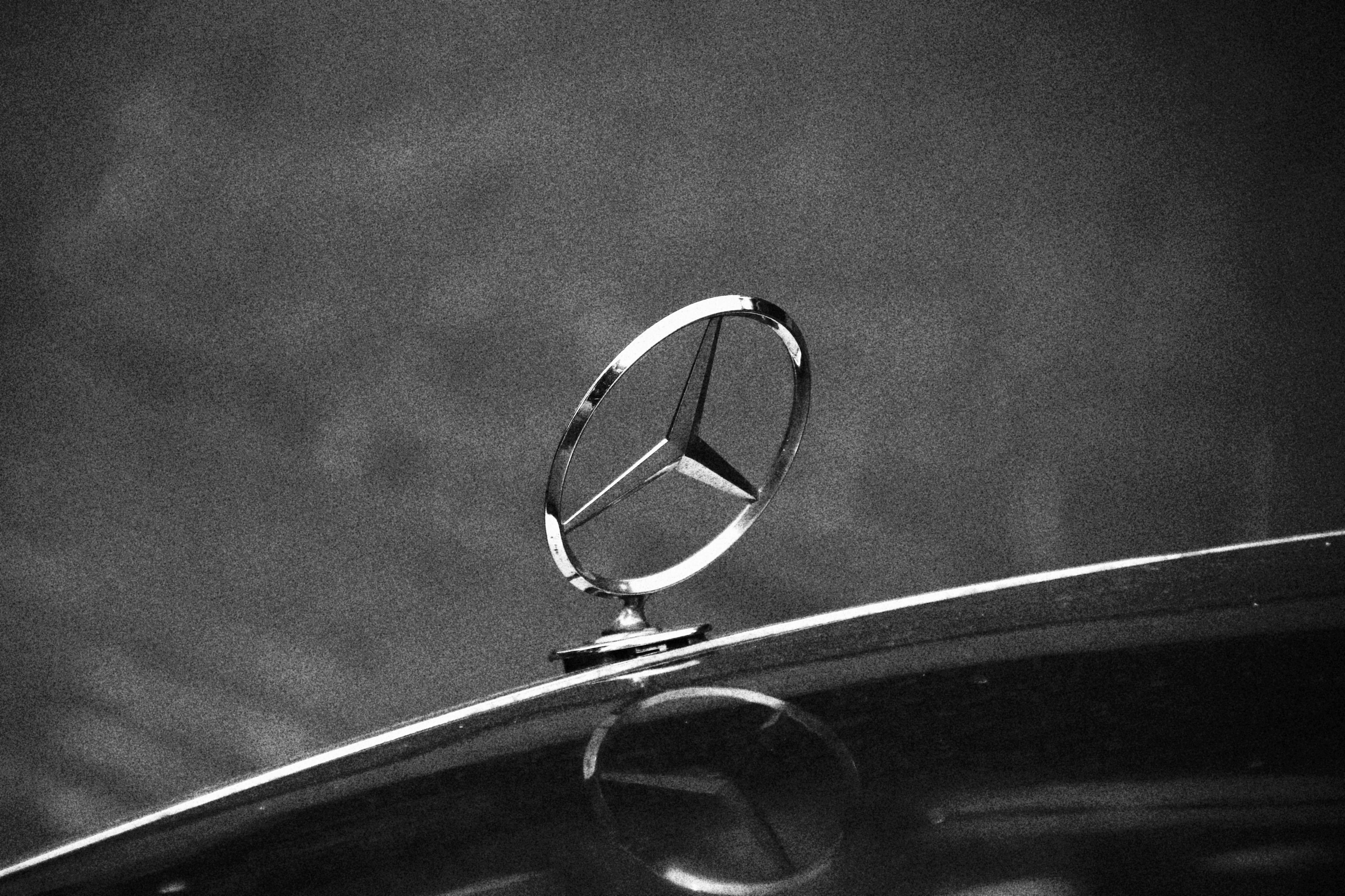 a mercedes emblem on the hood of a car