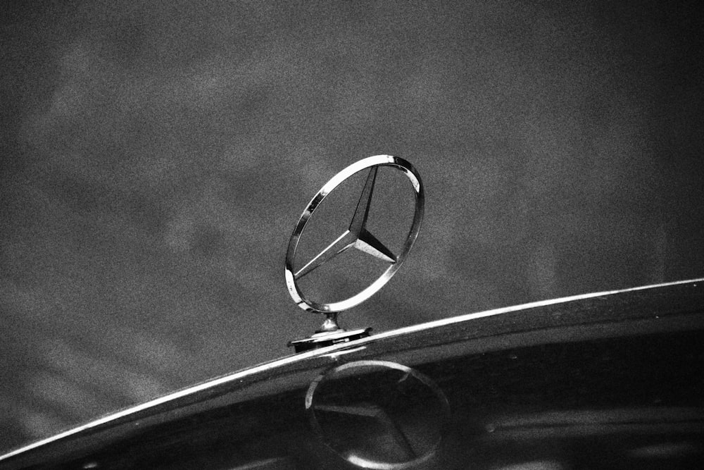 a mercedes emblem on the hood of a car