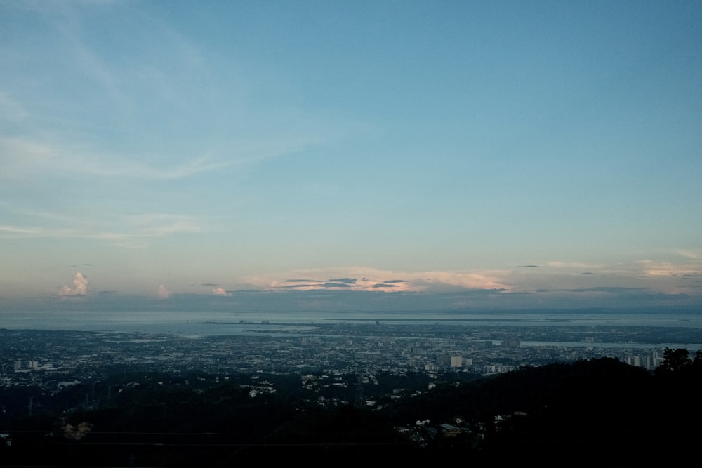 a view of a city and a body of water