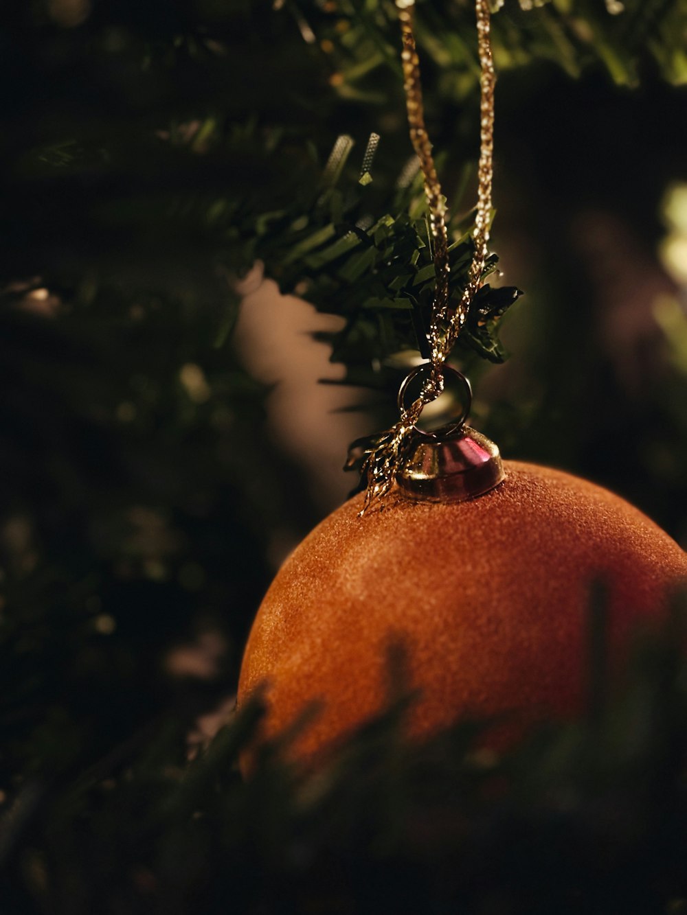 a close up of a christmas ornament on a tree