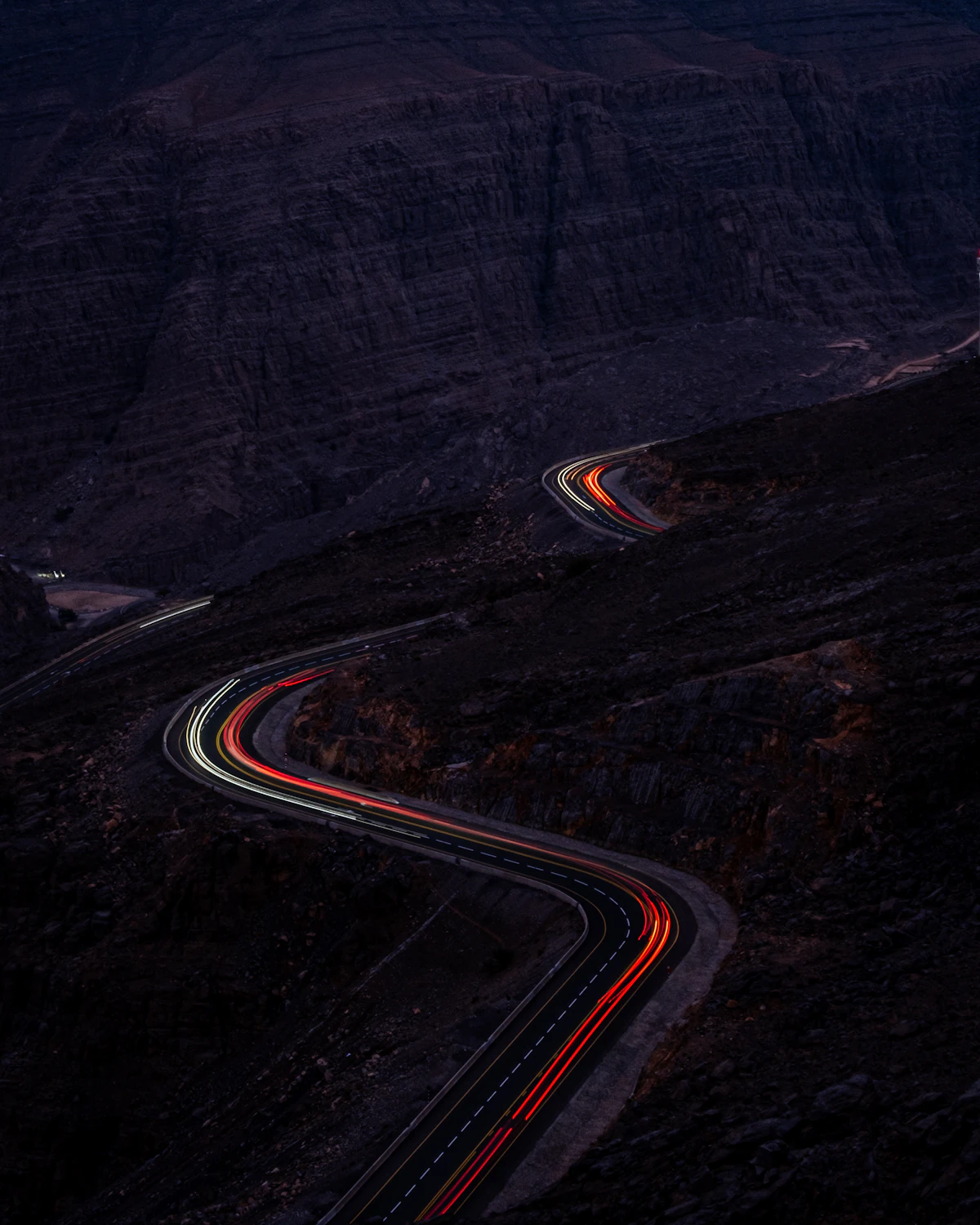Light trails on a mountain road at Jebel Jais at night