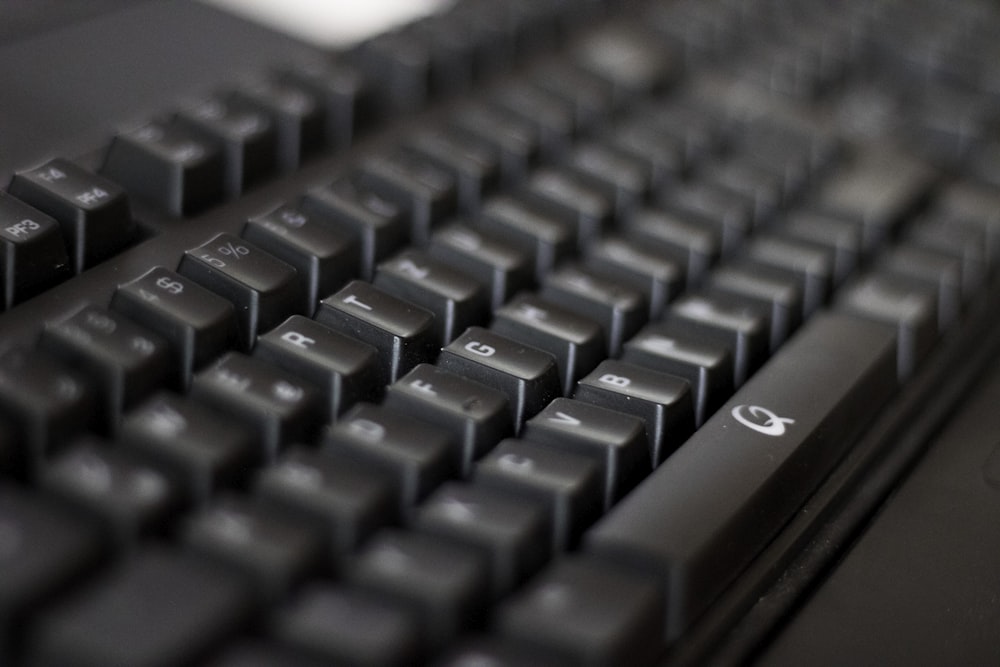 a close up of a black computer keyboard