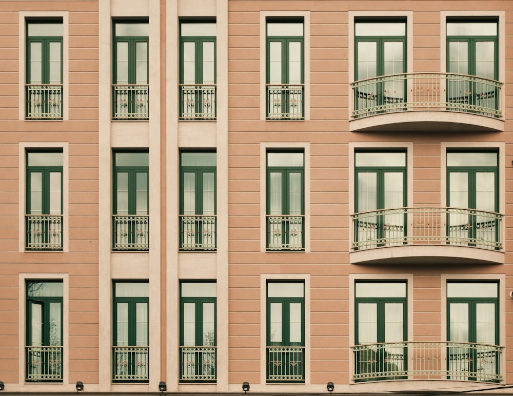 a tall building with balconies and balconies on the balconies