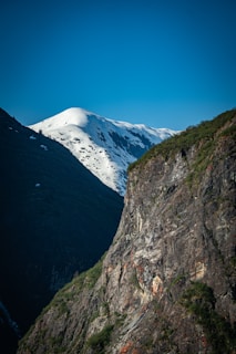 a view of a mountain with snow on it
