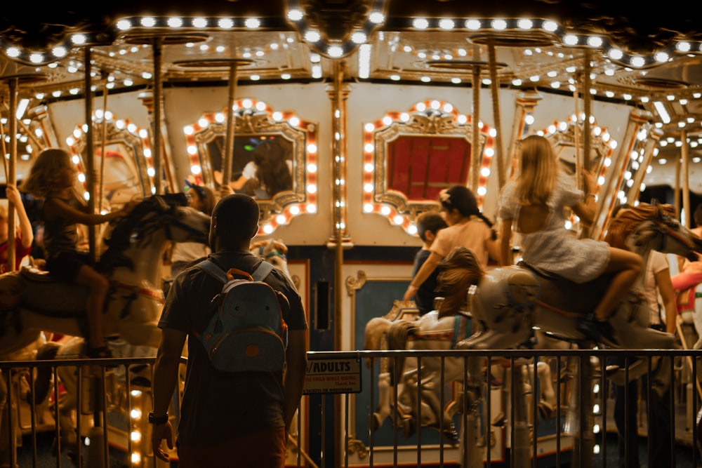 a group of people on a merry go round ride