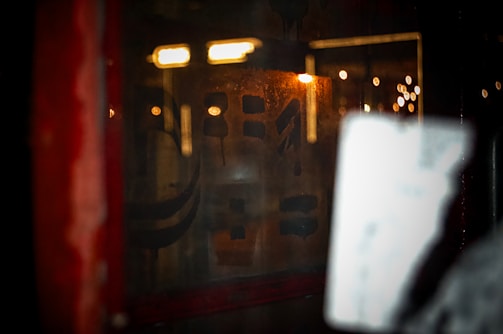 A dark-themed film frame showing intricate rotoscopy outlines glowing in gold.