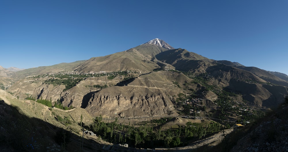 a view of a mountain with a small town below