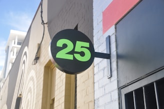 a close up of a sign on the side of a building