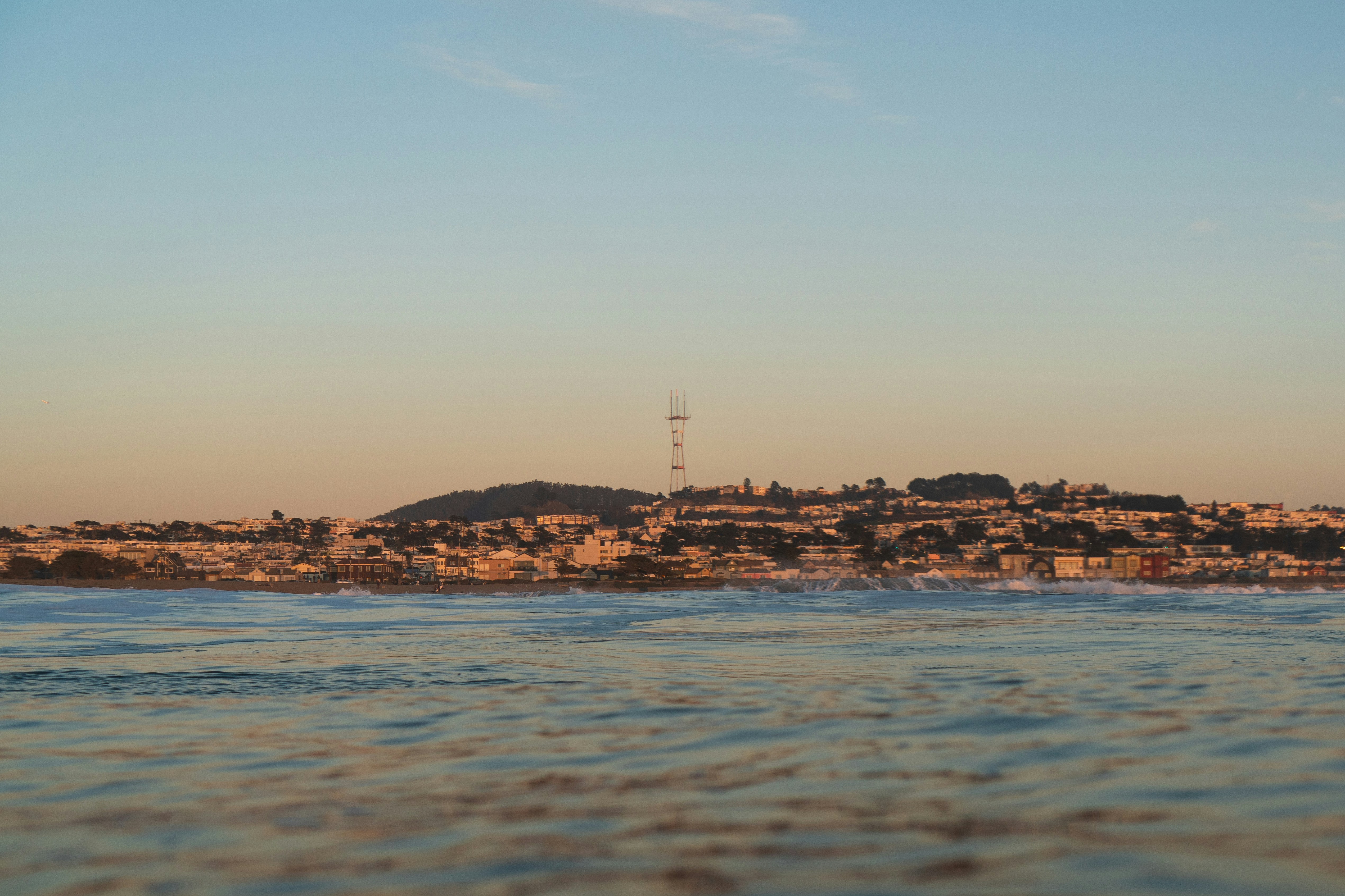 a view of a city from the ocean
