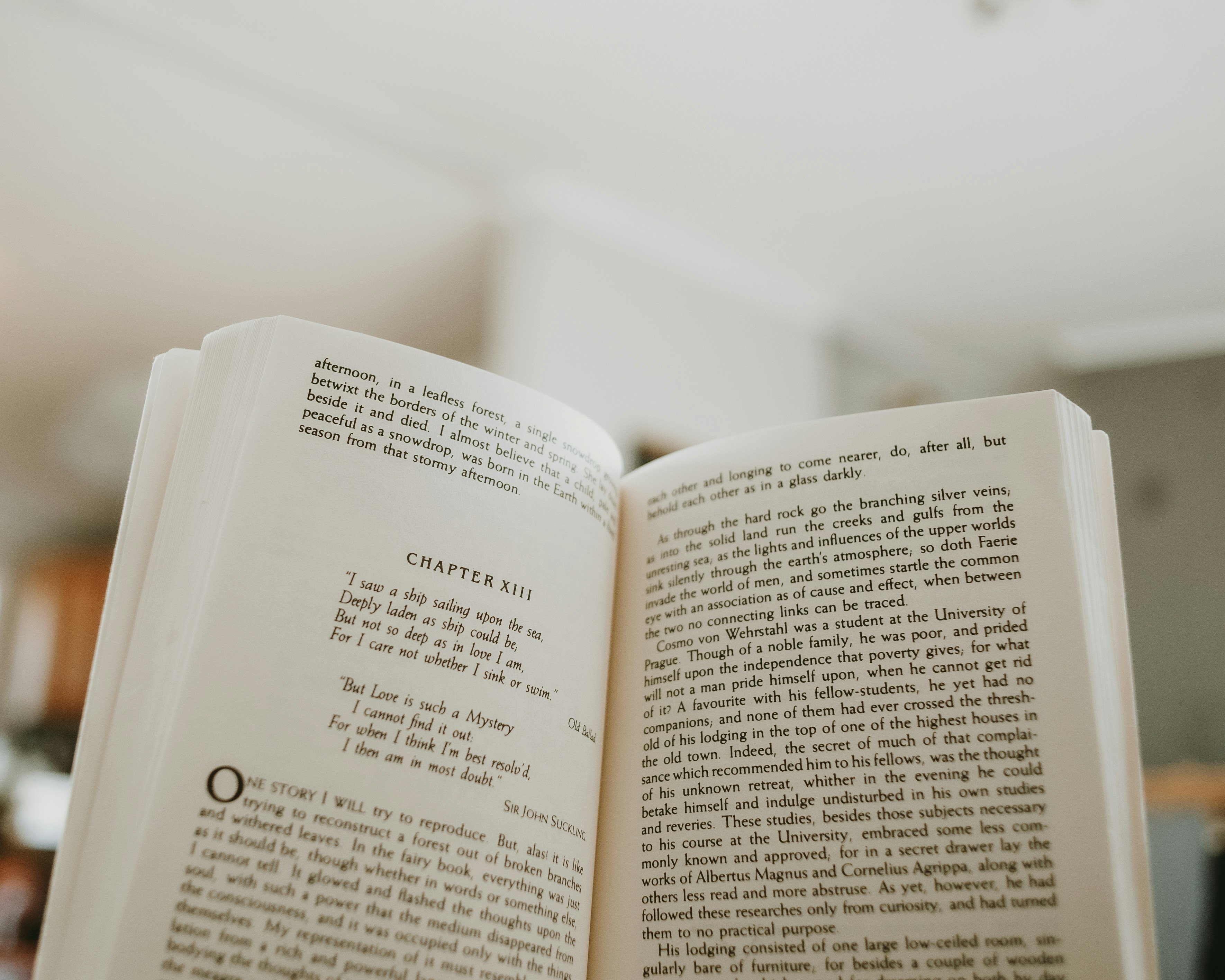 an open book sitting on top of a table