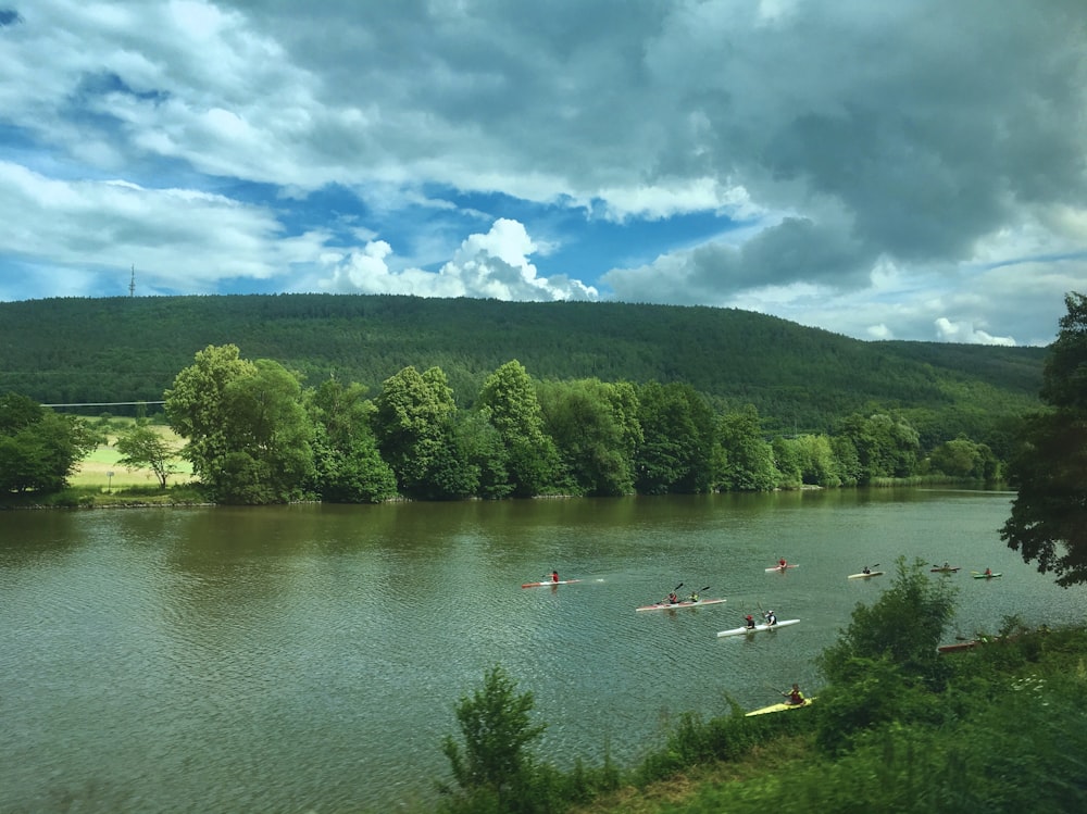 a body of water with canoes on it