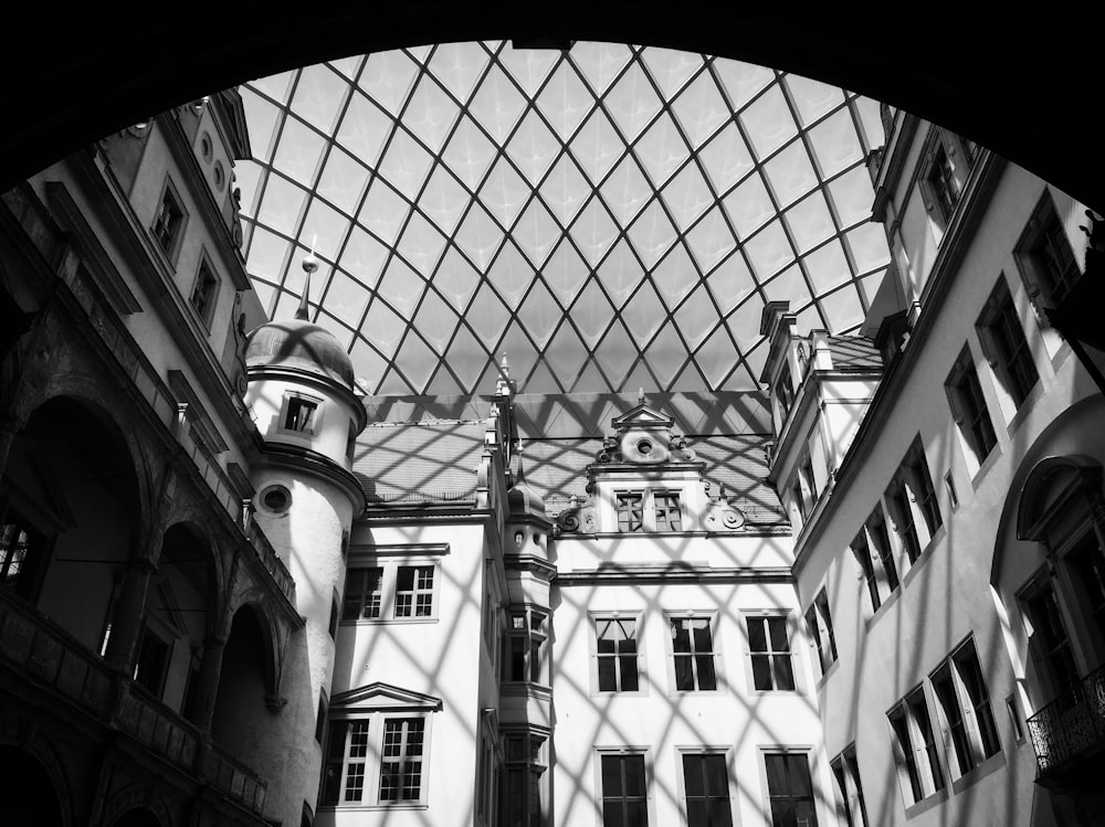 a very large building with a very tall glass roof