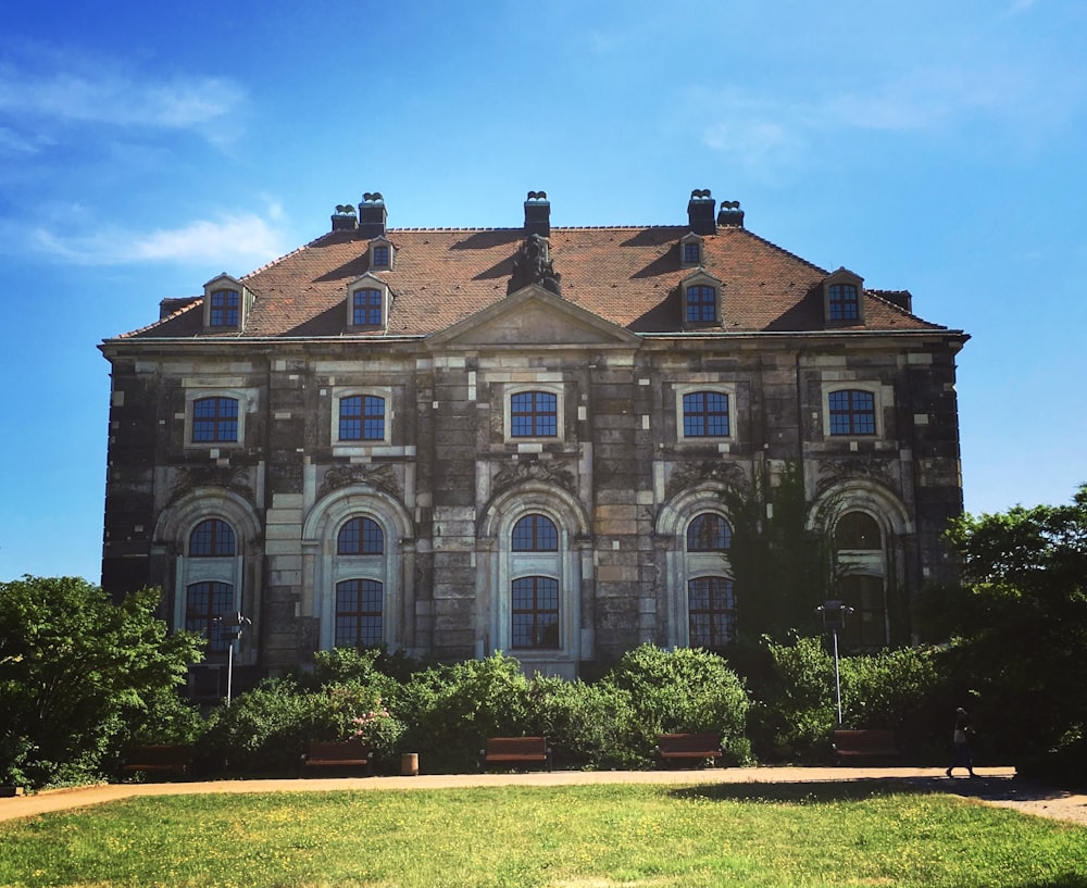 a large building with a lot of windows on top of it