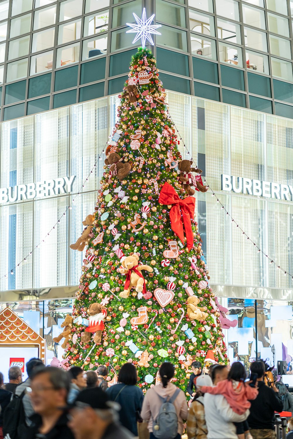 a large christmas tree in the middle of a mall