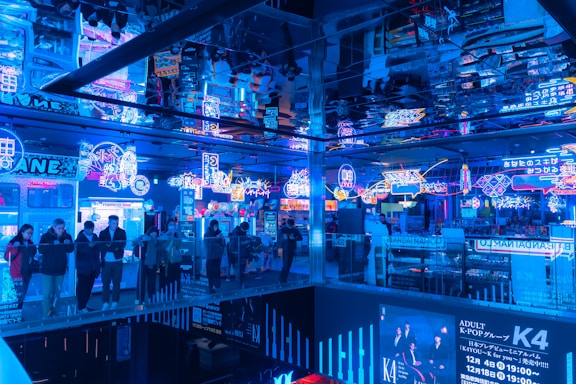 Modern restaurant interior with neon lights reflecting a vibrant atmosphere.