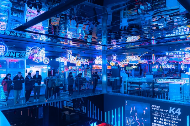 A vibrant hostel common area filled with travelers.