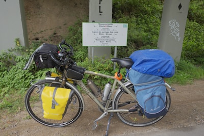 Durable waterproof bike panniers attached to a touring bicycle.
