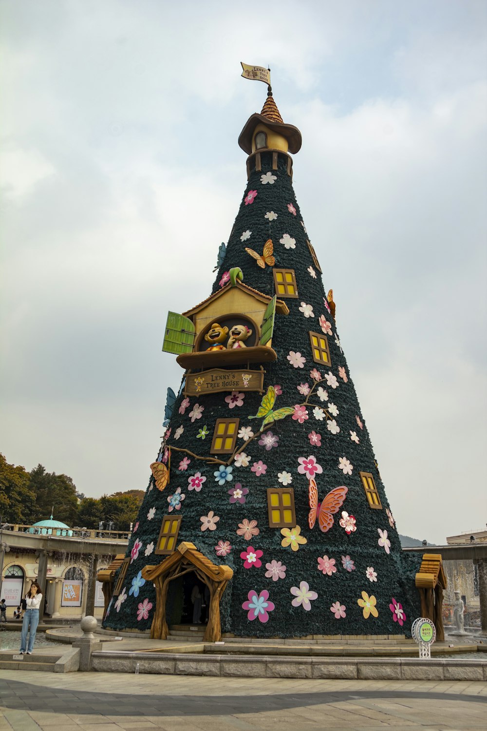 a very tall tower with a clock on it's side