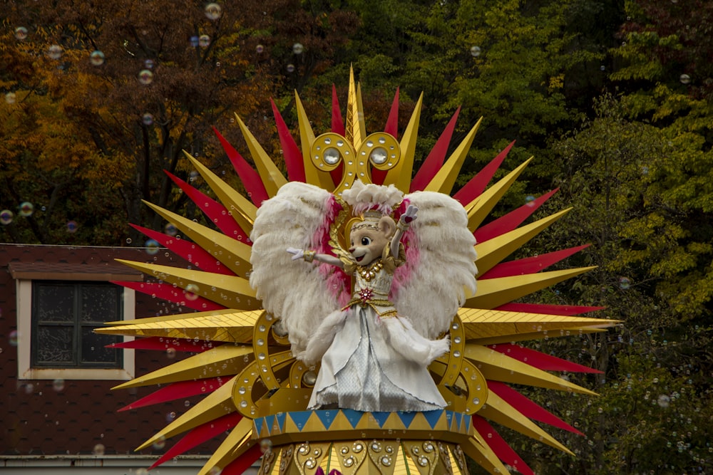 a statue of an angel on top of a building