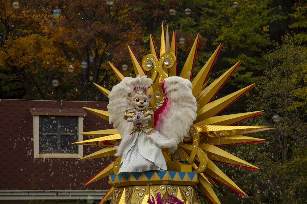 a float with a teddy bear on top of it