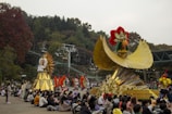 A scenic view of a local parade with floats and participants.