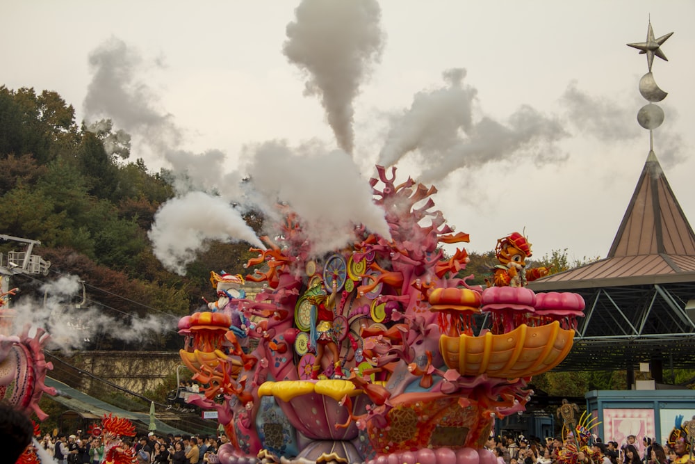 a parade float with smoke coming out of it