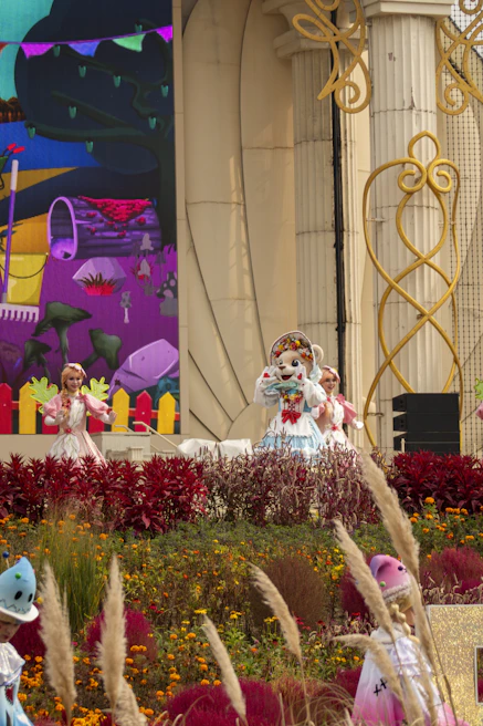 A heartfelt theater performance with students in colorful costumes on stage