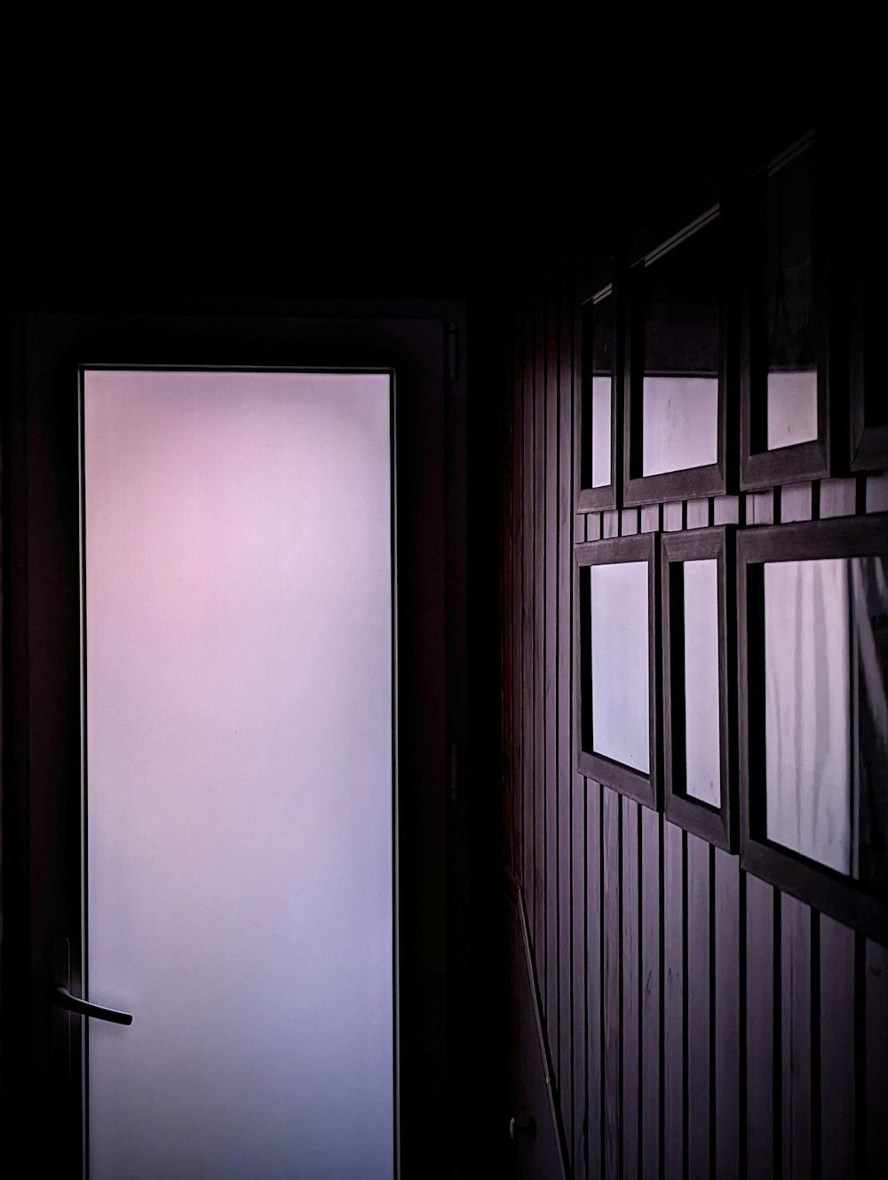 a door is open in a dark room