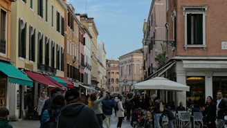 Group of happy travelers exploring a vibrant city street with cafes