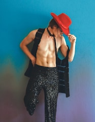 A stylish model wearing a classic western outfit in an urban setting.