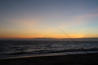 A tranquil sunset view over a fishing spot in the UK.