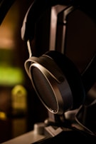 Close-up of over-ear headphones with soft padding.
