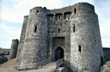 A stunning medieval castle with towering walls and battlements.