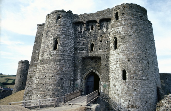 A stunning medieval castle with towering walls and battlements.