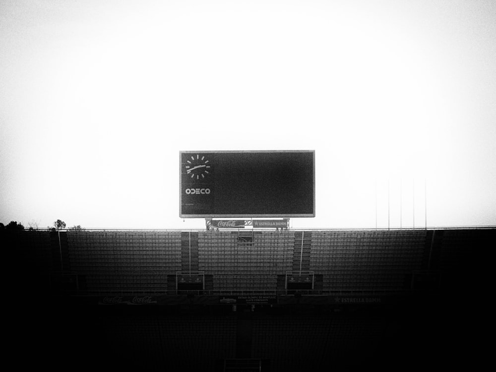 a black and white photo of a football field