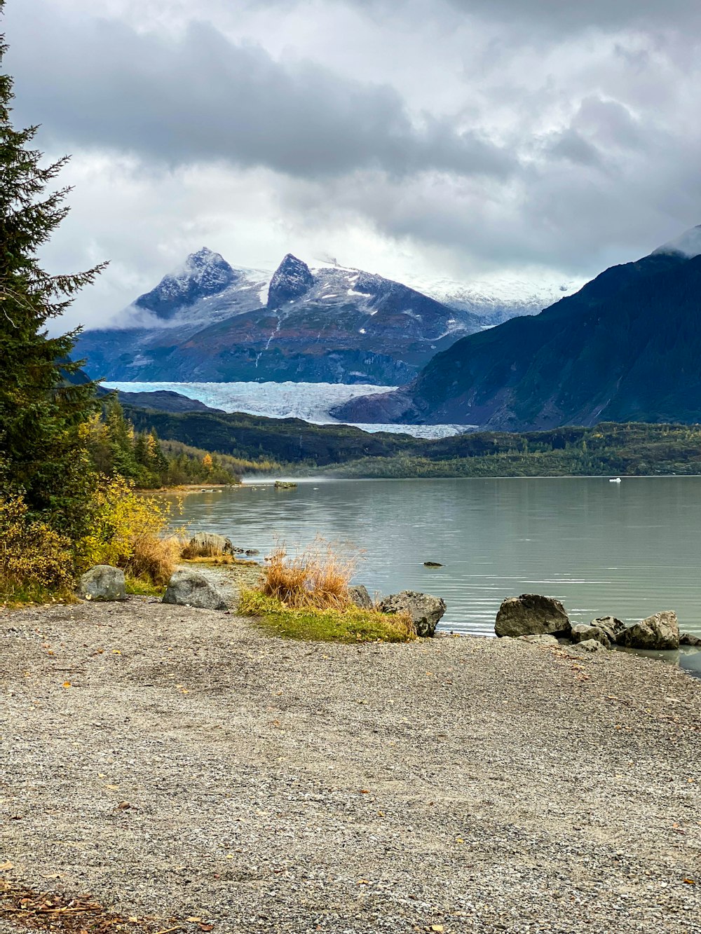 a view of a lake with mountains in the background