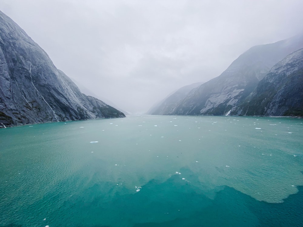 a large body of water surrounded by mountains