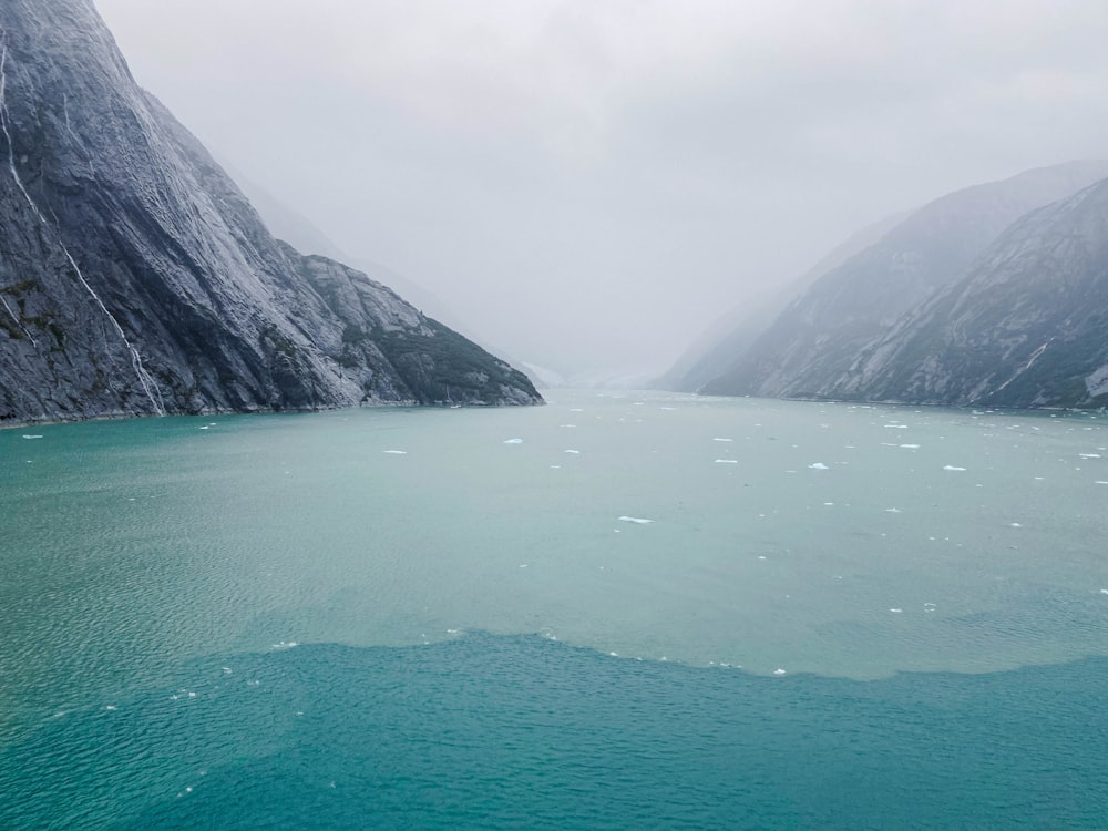 a large body of water surrounded by mountains