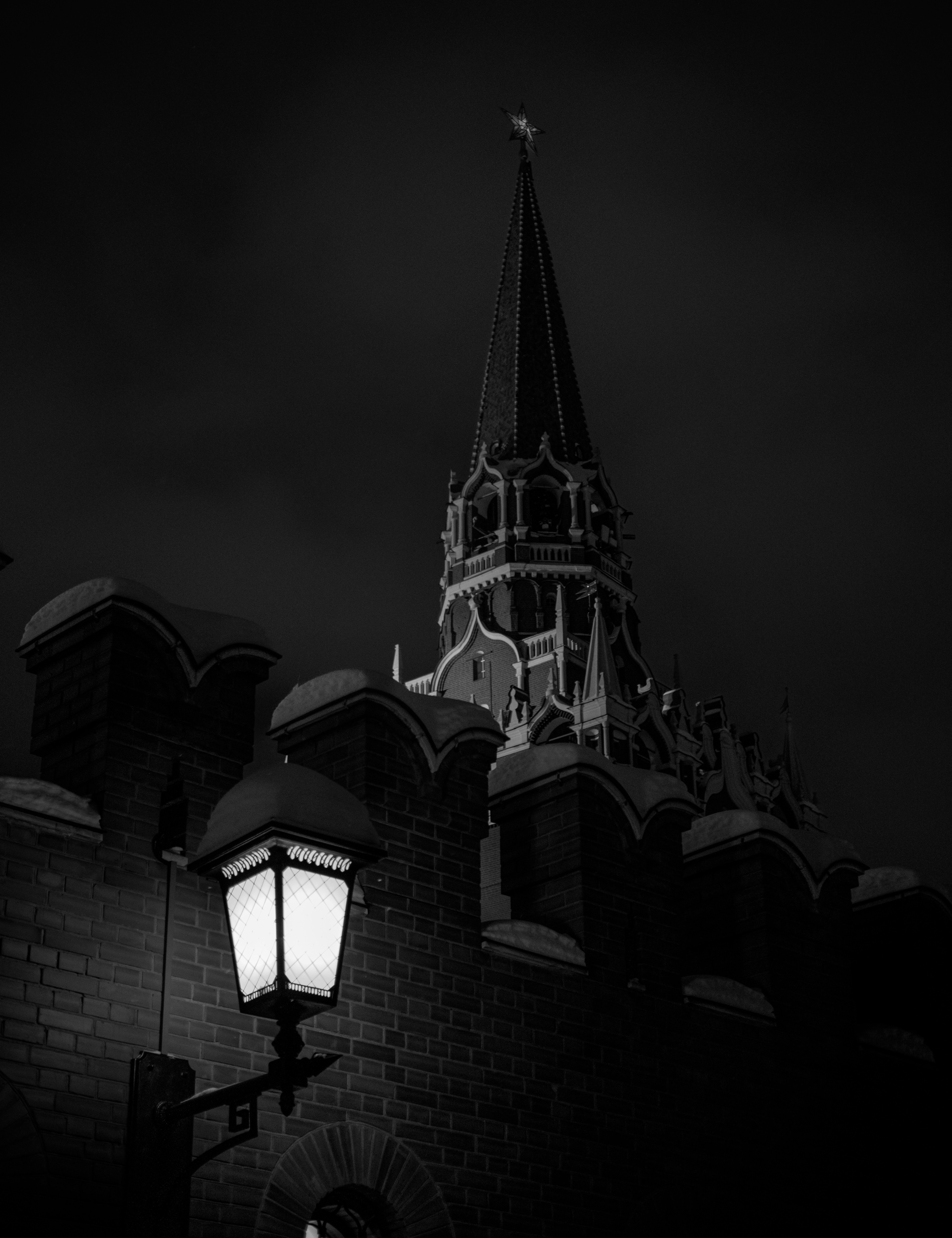 A black and white photo of a clock tower photo – Free Human Image on ...