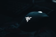 Interactive mouse movement effect illustrated by a glowing shape responding to cursor.