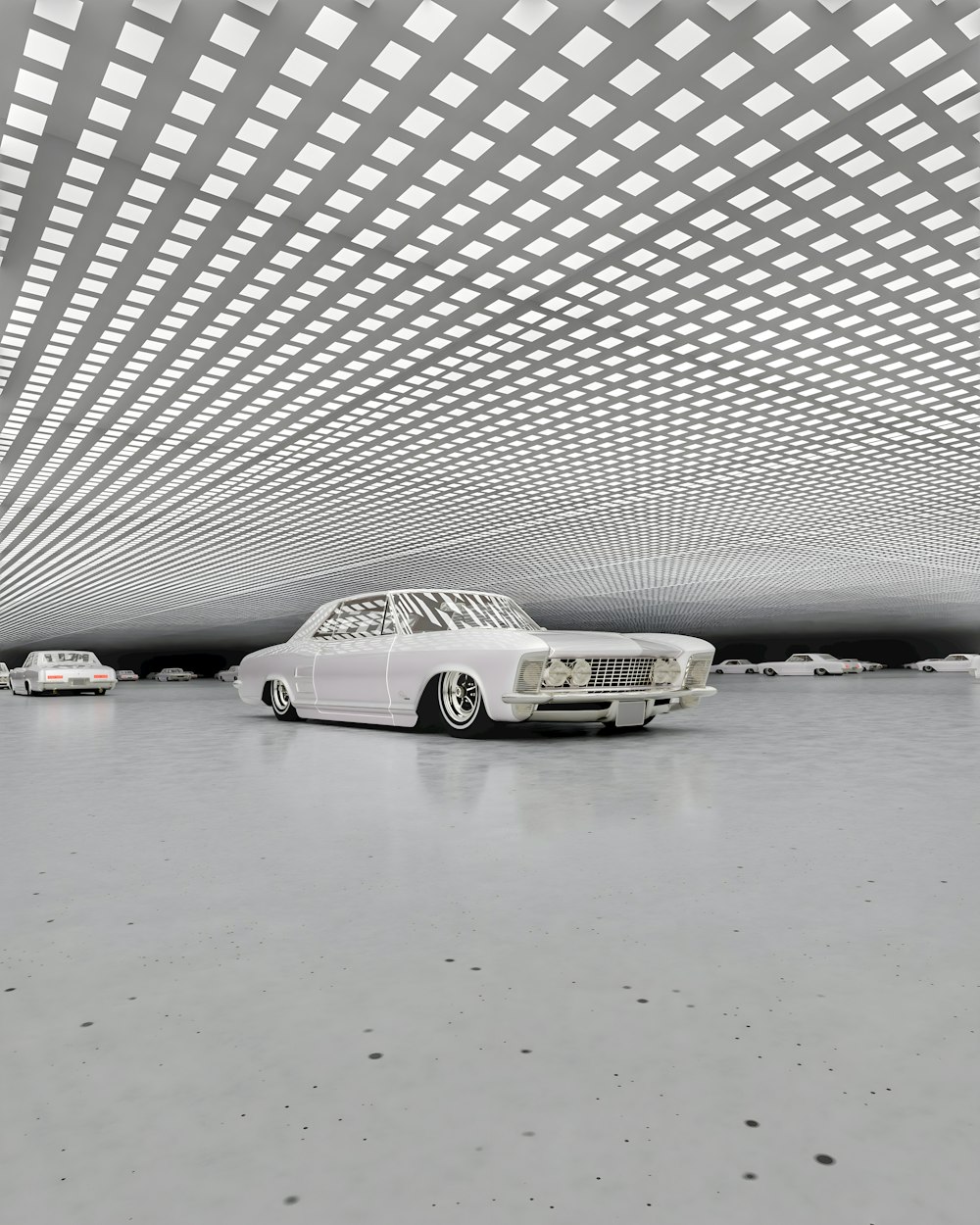 a white car parked in a parking garage