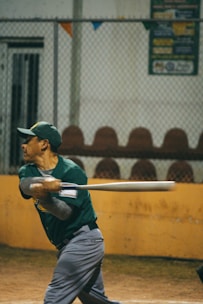 A baseball player mid-swing in a sunny stadium, capturing the excitement of baseball picks.
