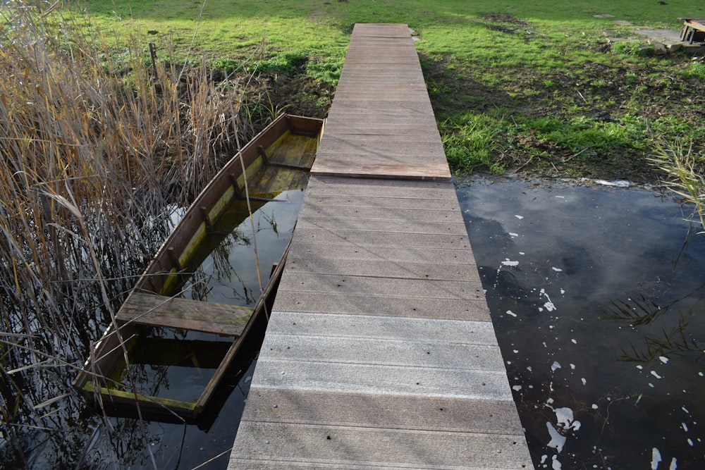 a wooden bridge over a body of water